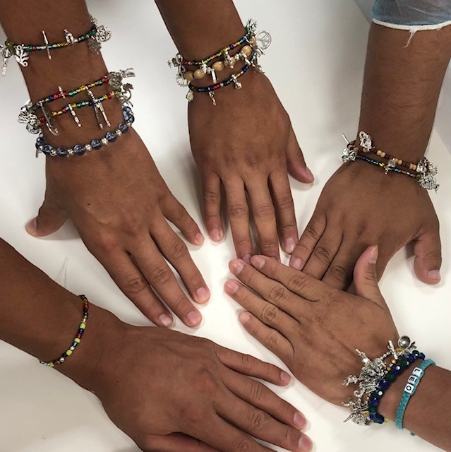 Memory Charm Bracelets - Beads and charms<br />
Created by unaccompanied refugee children in a shelter program